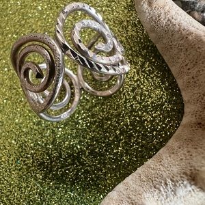 Sterling silver wide swirl ring never worn..